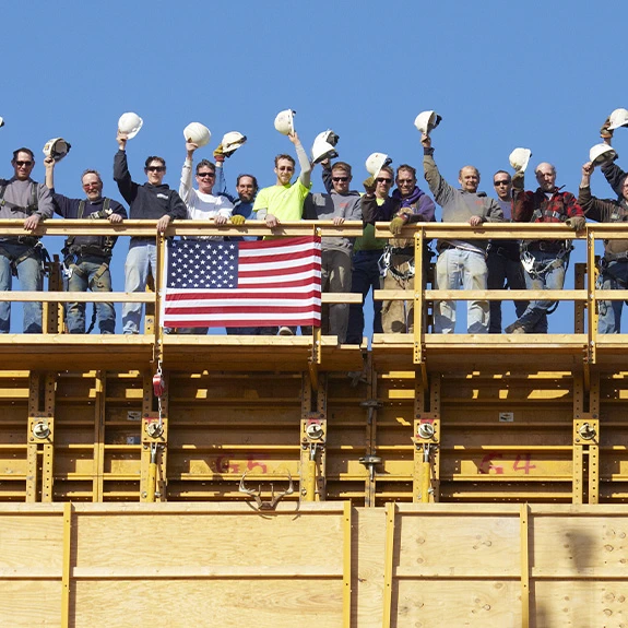 Conlon Construction workers with American Flag
